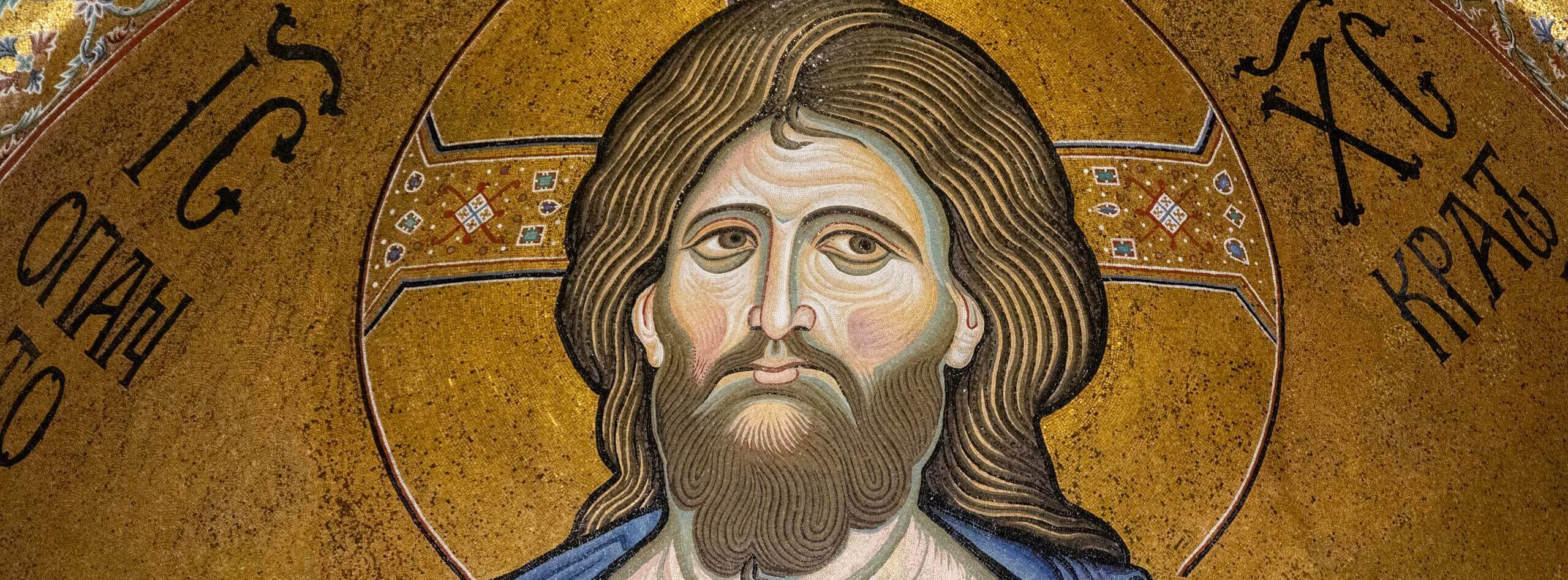 Detailed mosaic of Christ Pantocrator with intricate gold and religious symbolism.